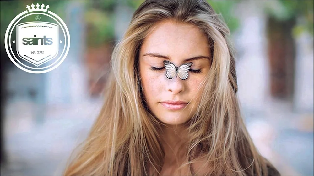 Butterfly girl with butterfly on her face