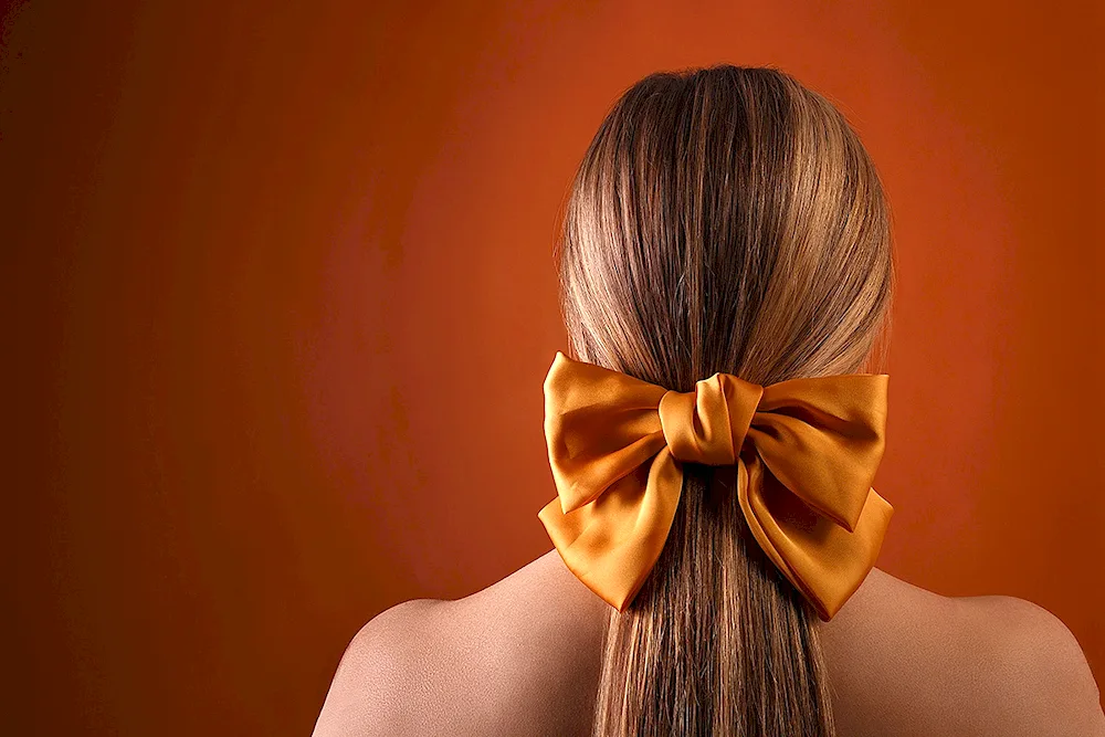 Ponytail for girls with a bow elastic band