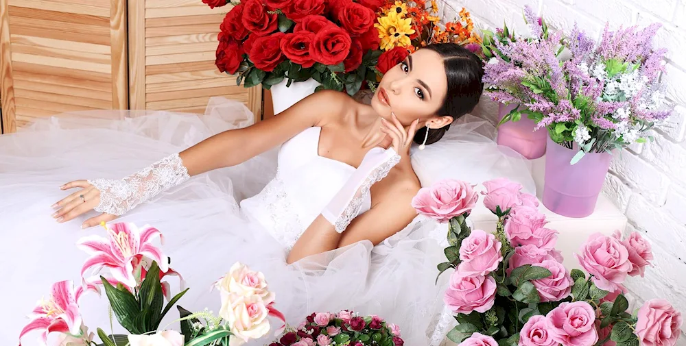 Girl with a bouquet of roses