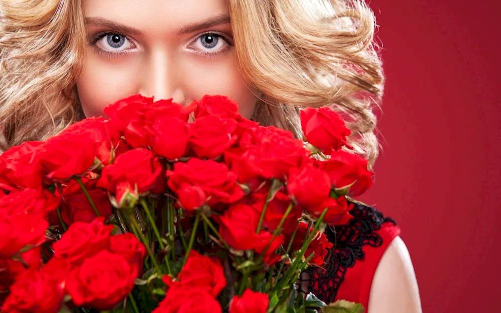 Girl with bouquet of roses