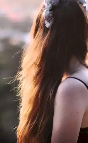 Girl with long auburn hair