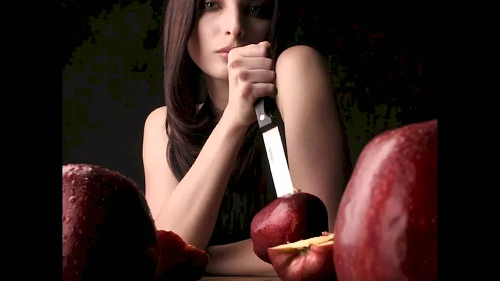 Beautiful girls with knife in hands