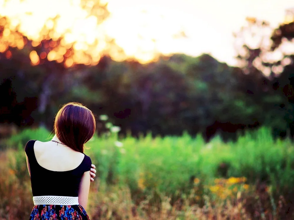 Girl with a back bob in nature
