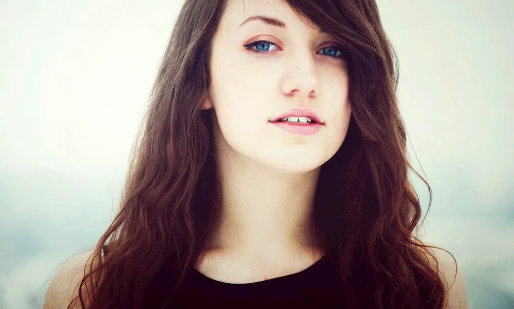 Girl with brown hair and blue eyes