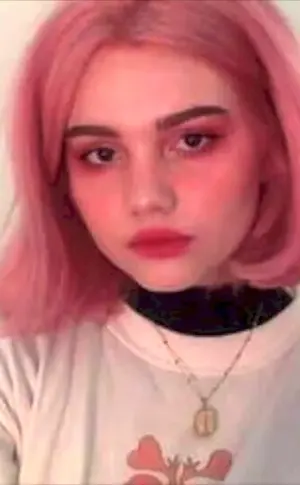 Girl with short pink hair