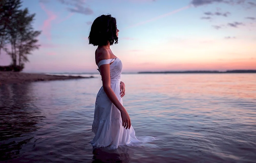 Girl with short hair at the sea