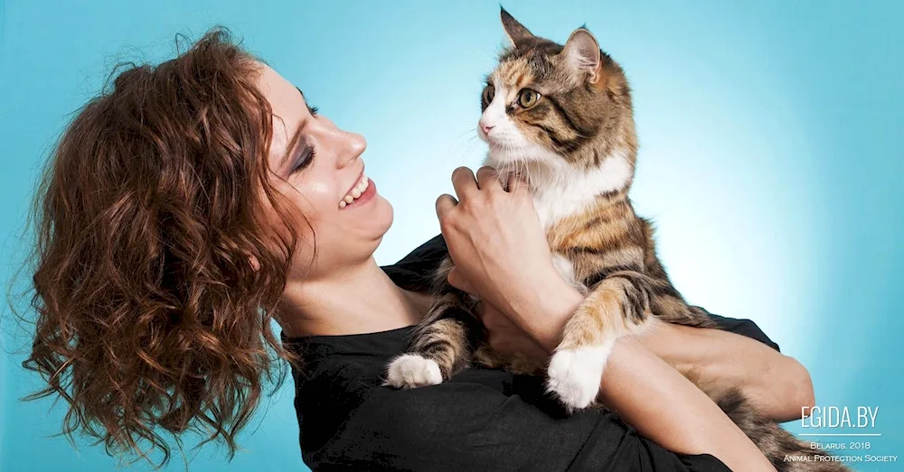 Girl holding a cat