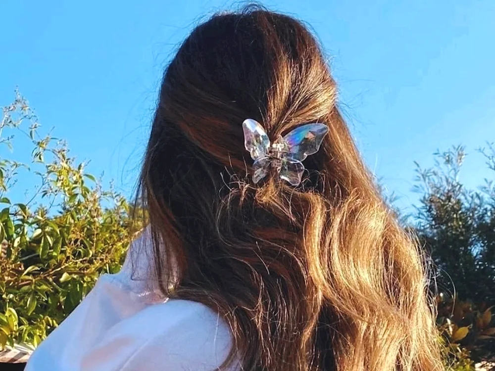 Girl with a crab in her hair
