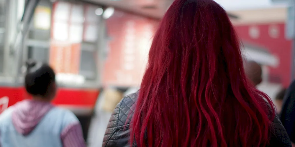 Red hair with red strands