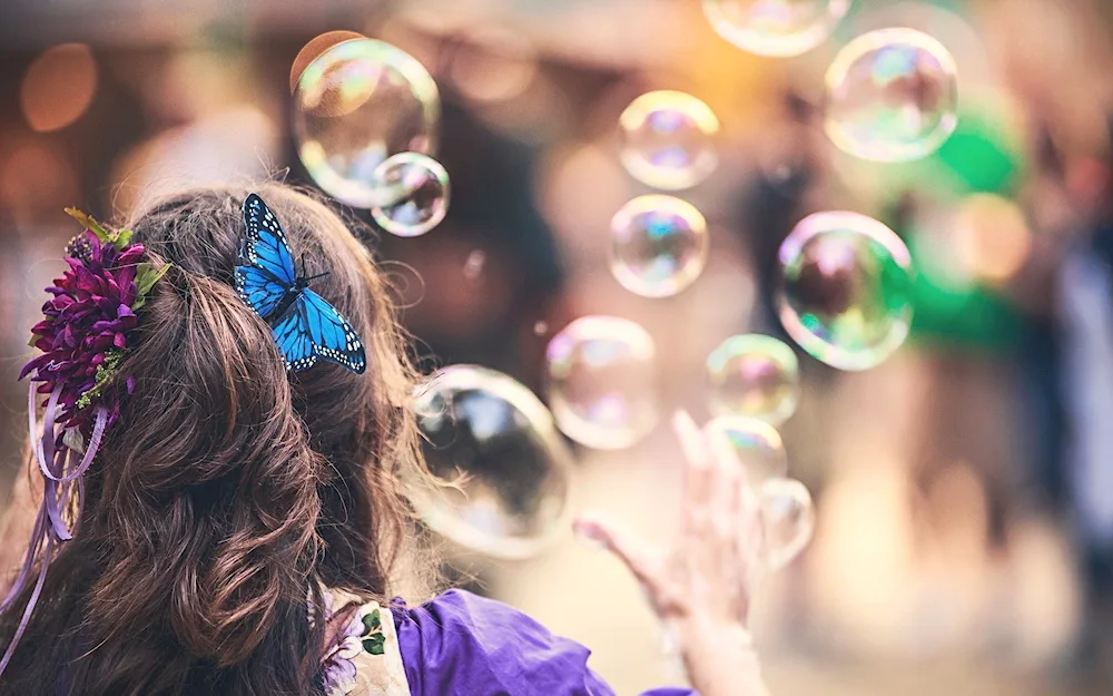 Girl with soap bubbles