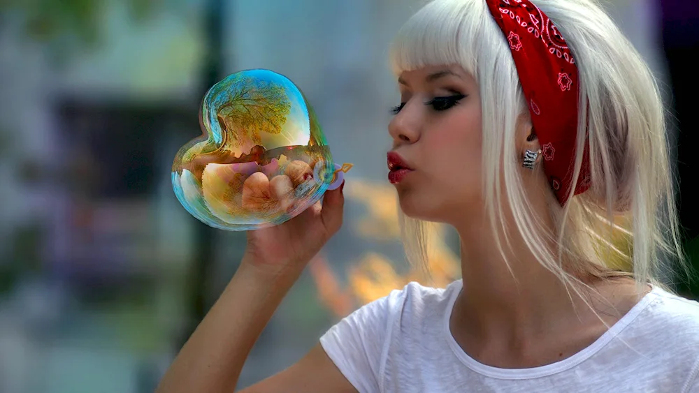Girl with soap bubbles