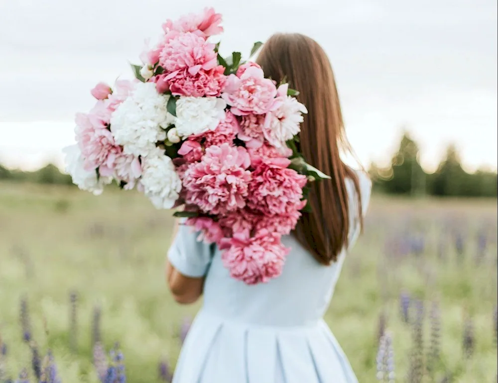 Girl with peonies