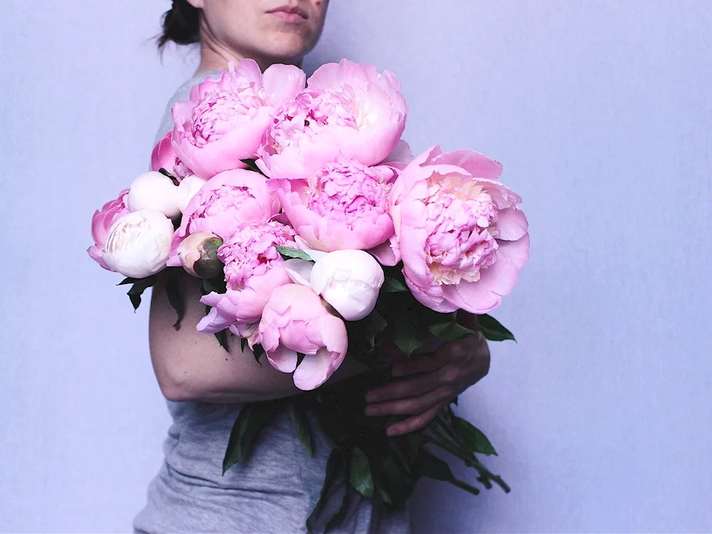 Girl with peonies