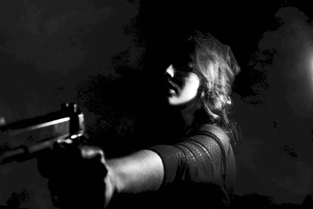 Woman with gun