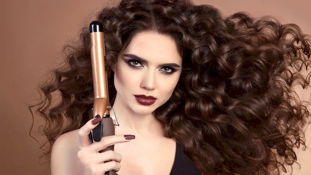 Girl with a curling iron