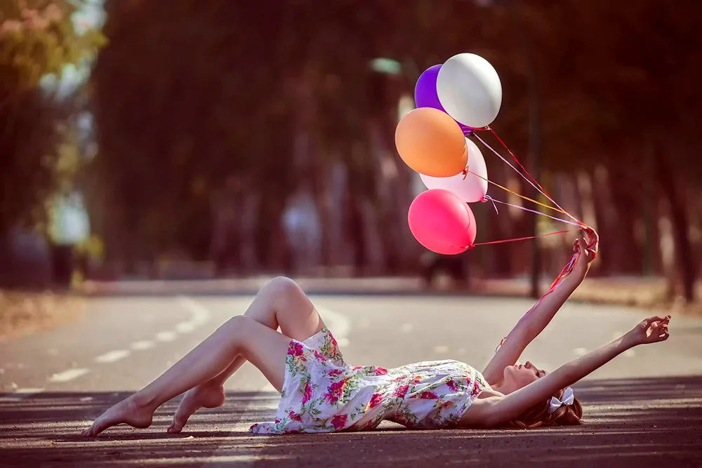 Girl with balloons