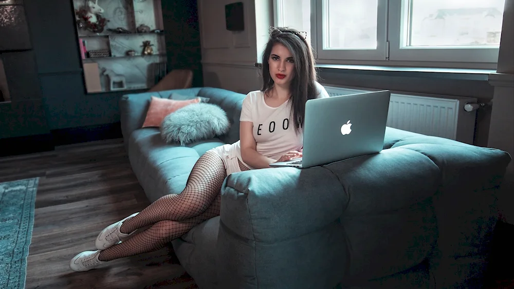 Girl sitting on the sofa