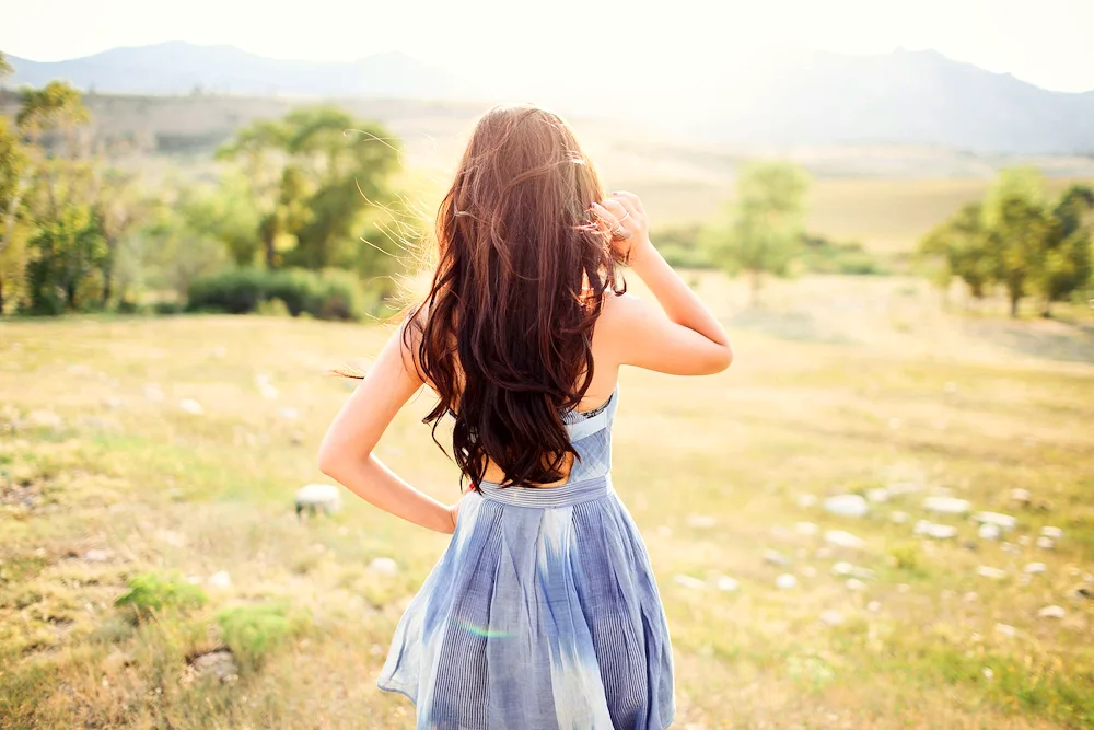 Girl with long brown hair from the back