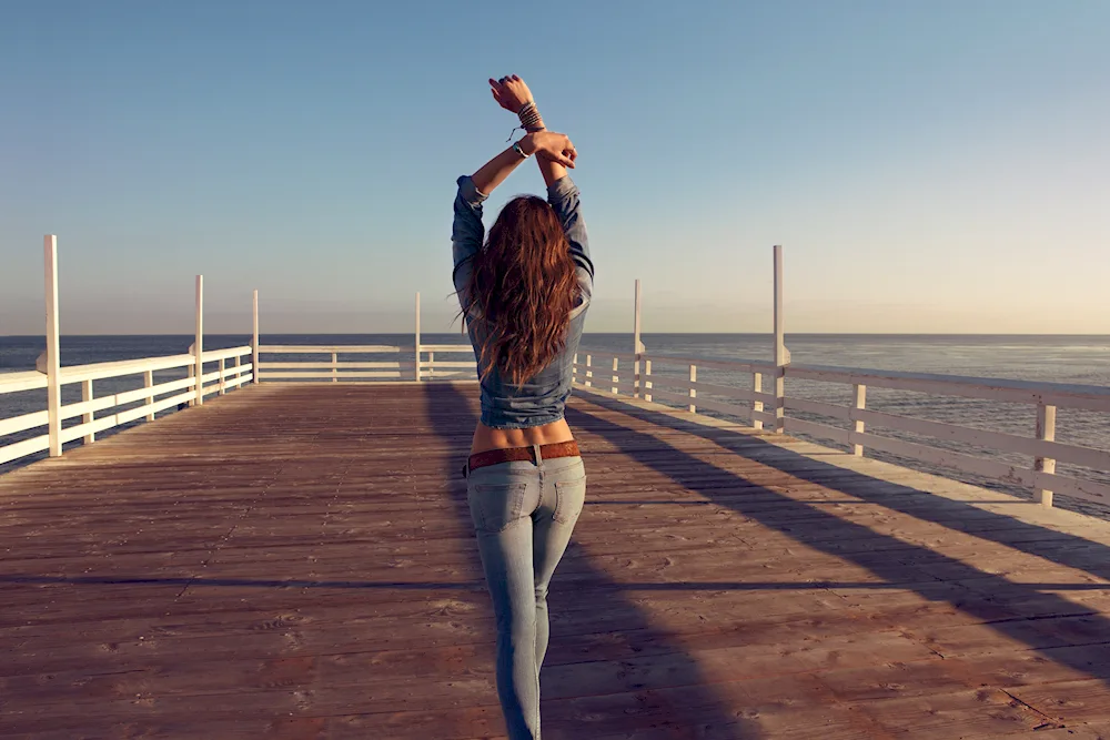 Brunette on the sea