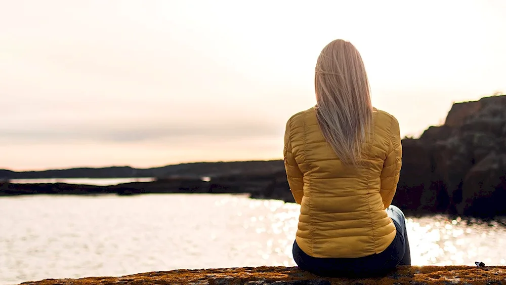 Blonde girl at sea