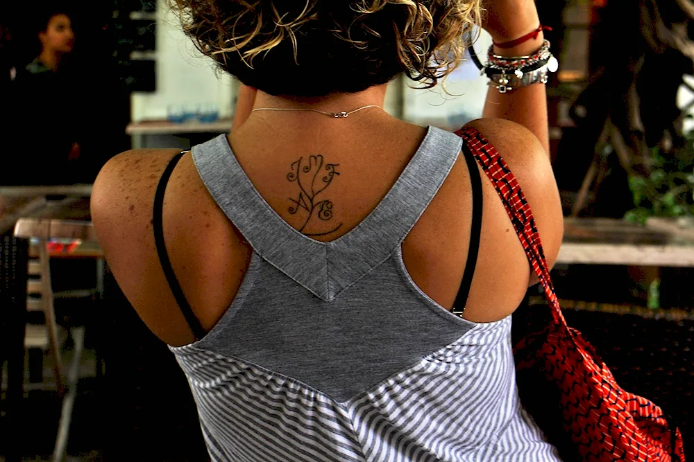 Girl top on her shoulder