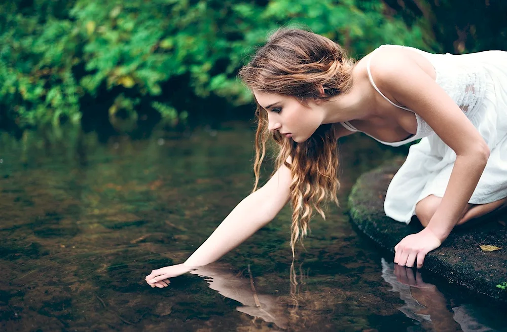 Girl by the river