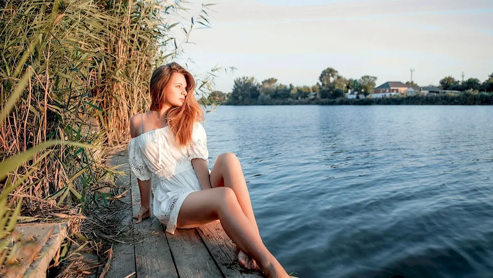 Girl by the river