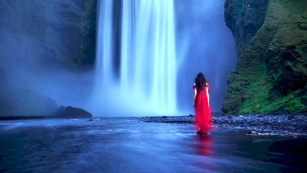 Girl at a waterfall Waterfall