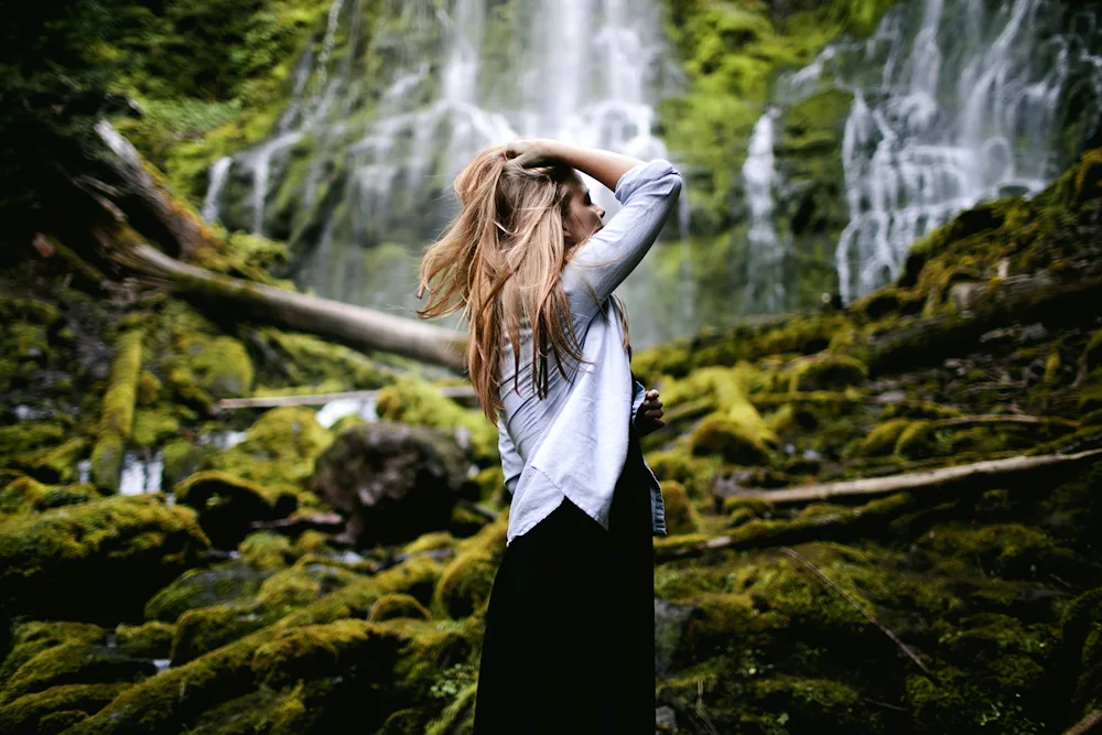 Girl at the waterfall