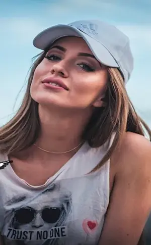Girl in white t-shirt and cap