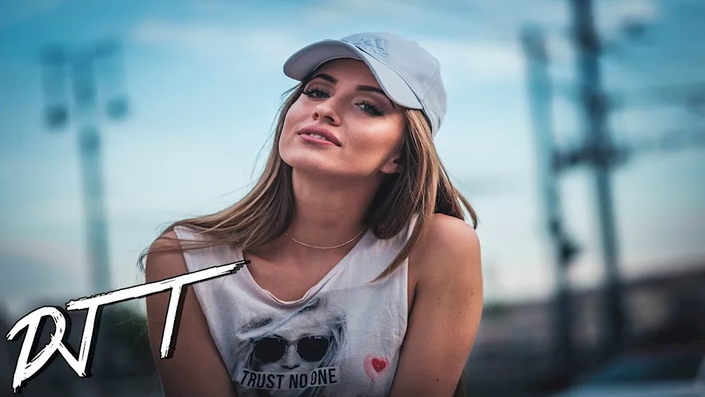 Girl in white t-shirt and cap