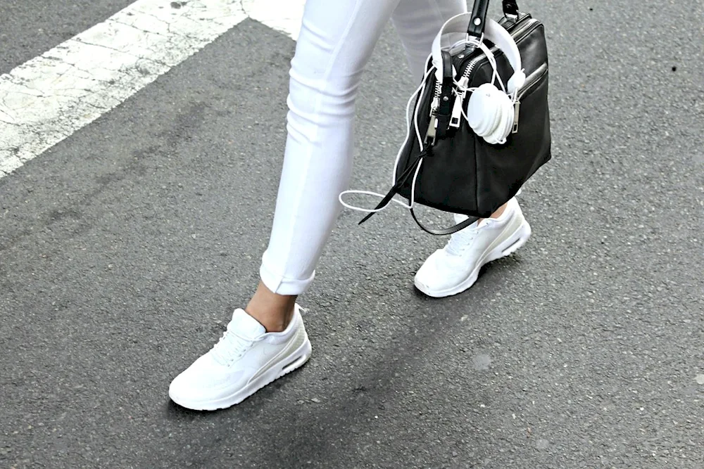 Girl in white sneakers