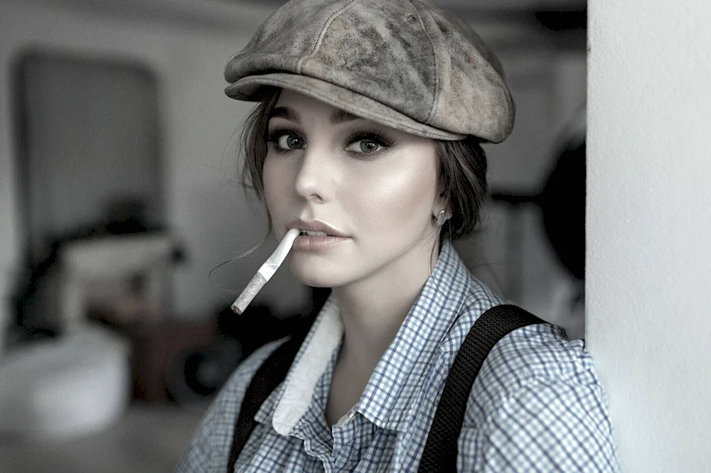Baseball cap on her head