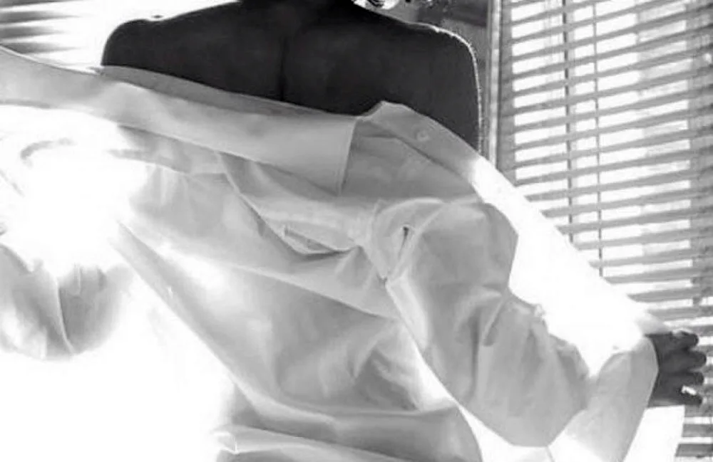 Girl with a back bob in a man's shirt