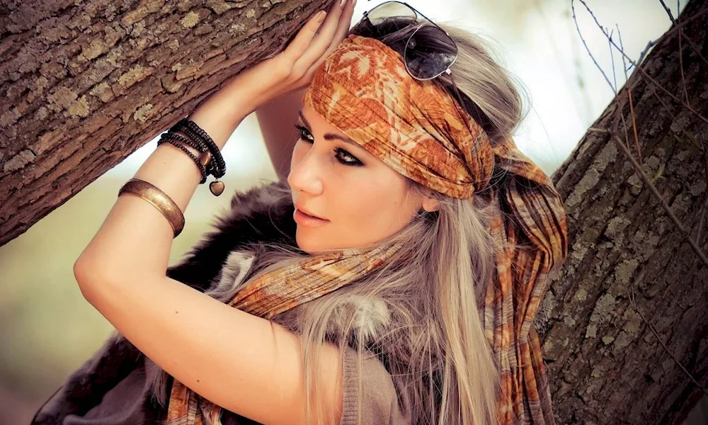 Afro curls hairstyle with headscarf