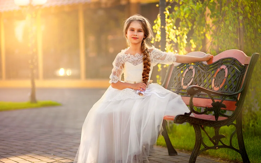 Girl in a bouffant dress sitting