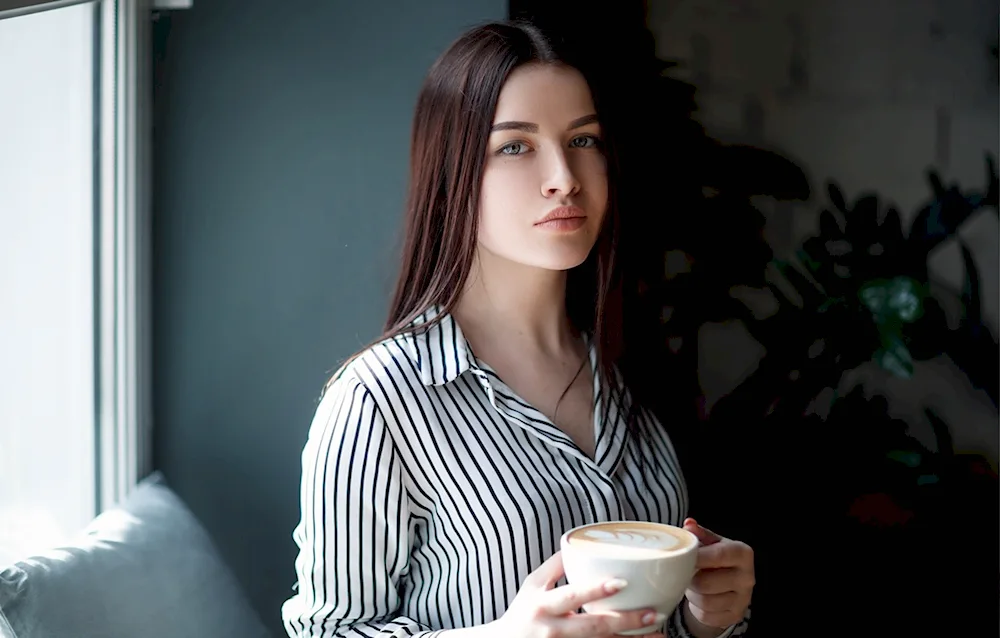 Girl with a cup of coffee