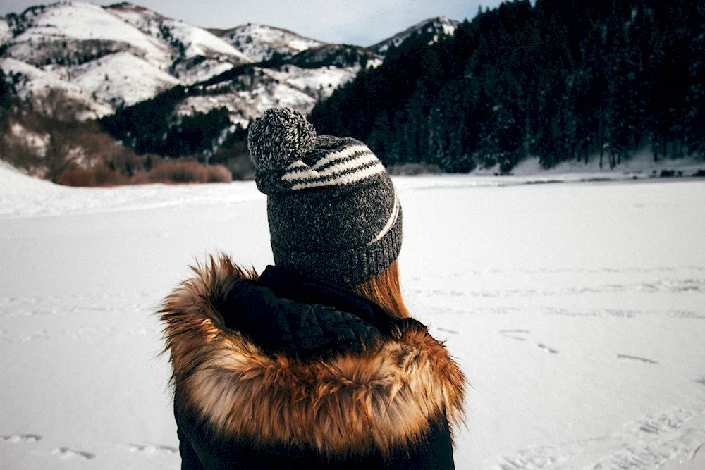 Girl in a hat in winter