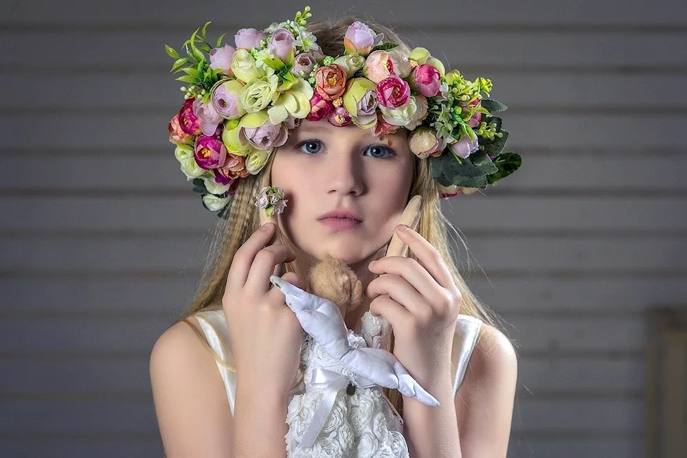 Girl with wreath of flowers