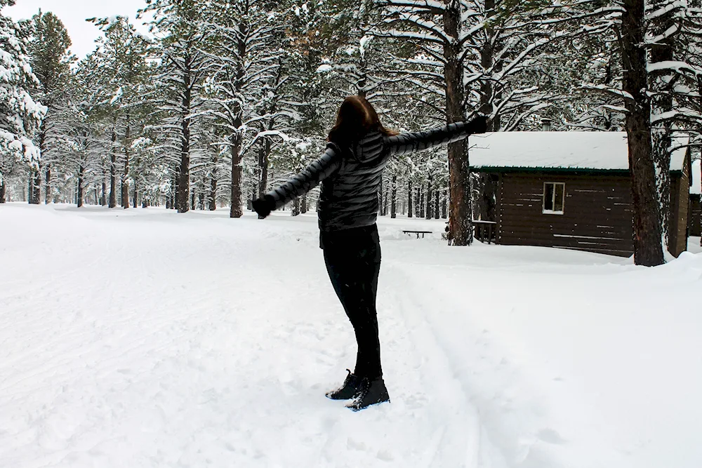 Girl in winter forest