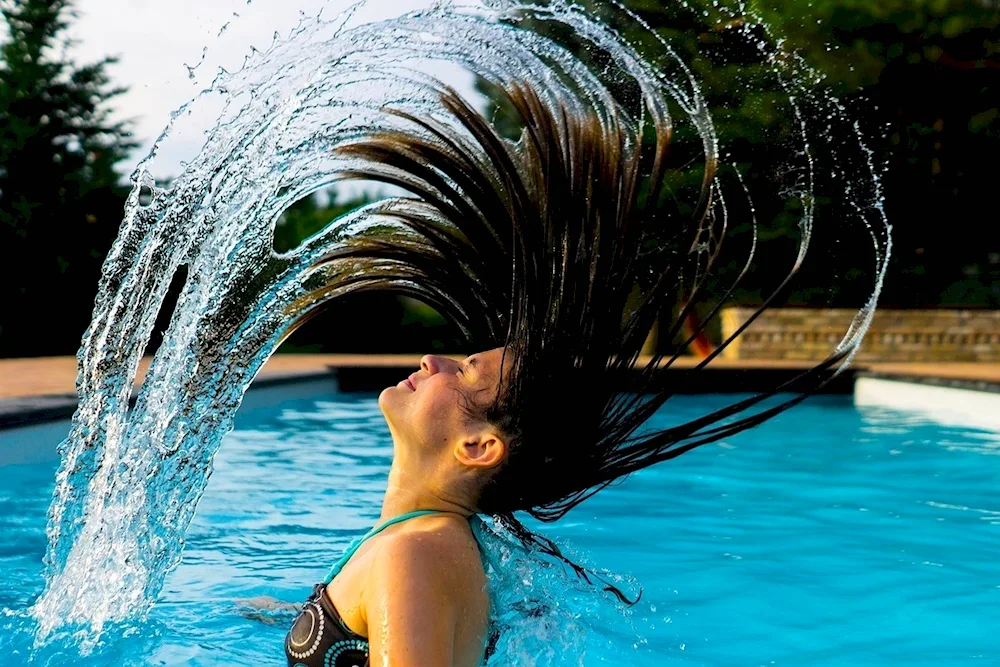 Girl diving out of the water