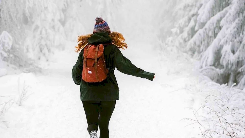 Girl in hat in winter winter