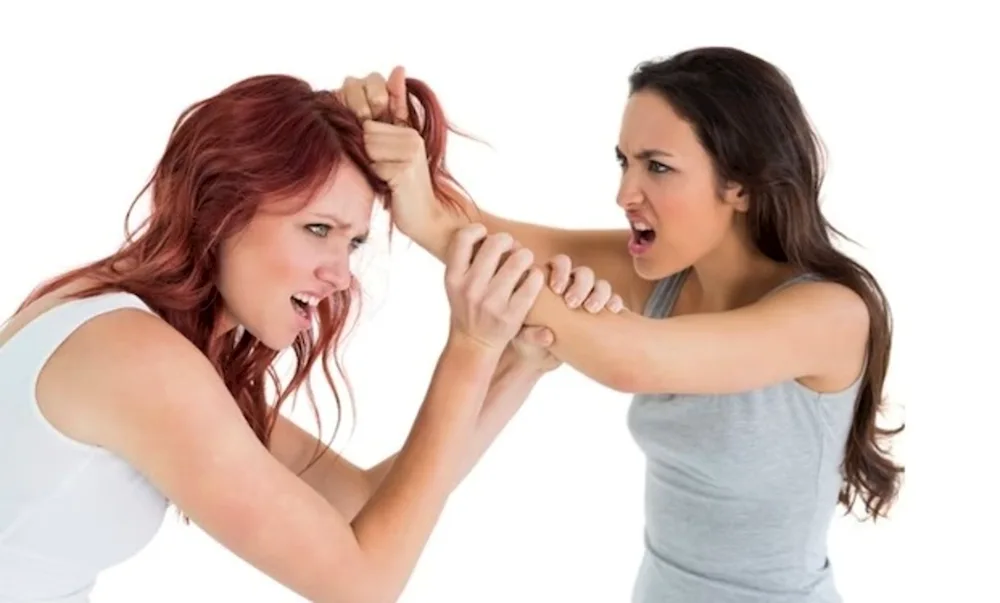 Guy fighting for girl's hair