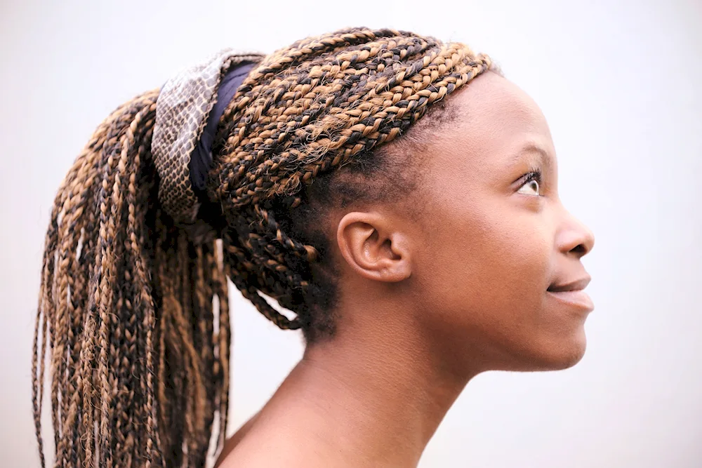 Rianna with afro braids