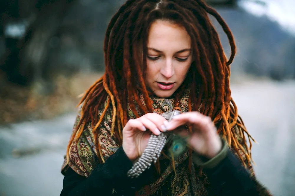 Dreadlocks with feathers