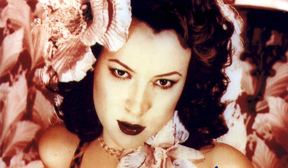 Jennifer Tilly as a young girl