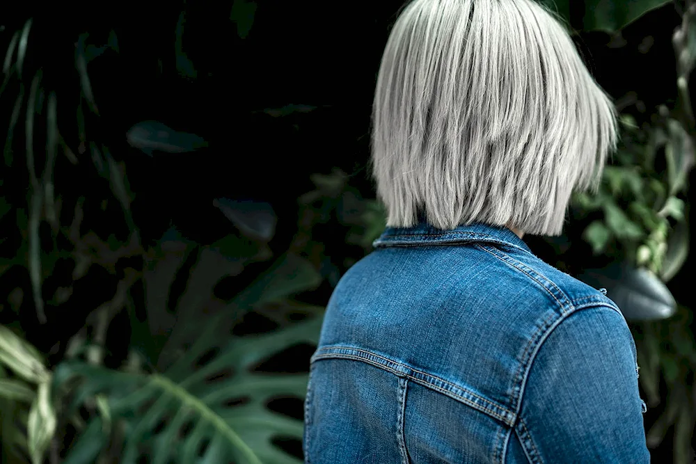 Jeansuit girl with back