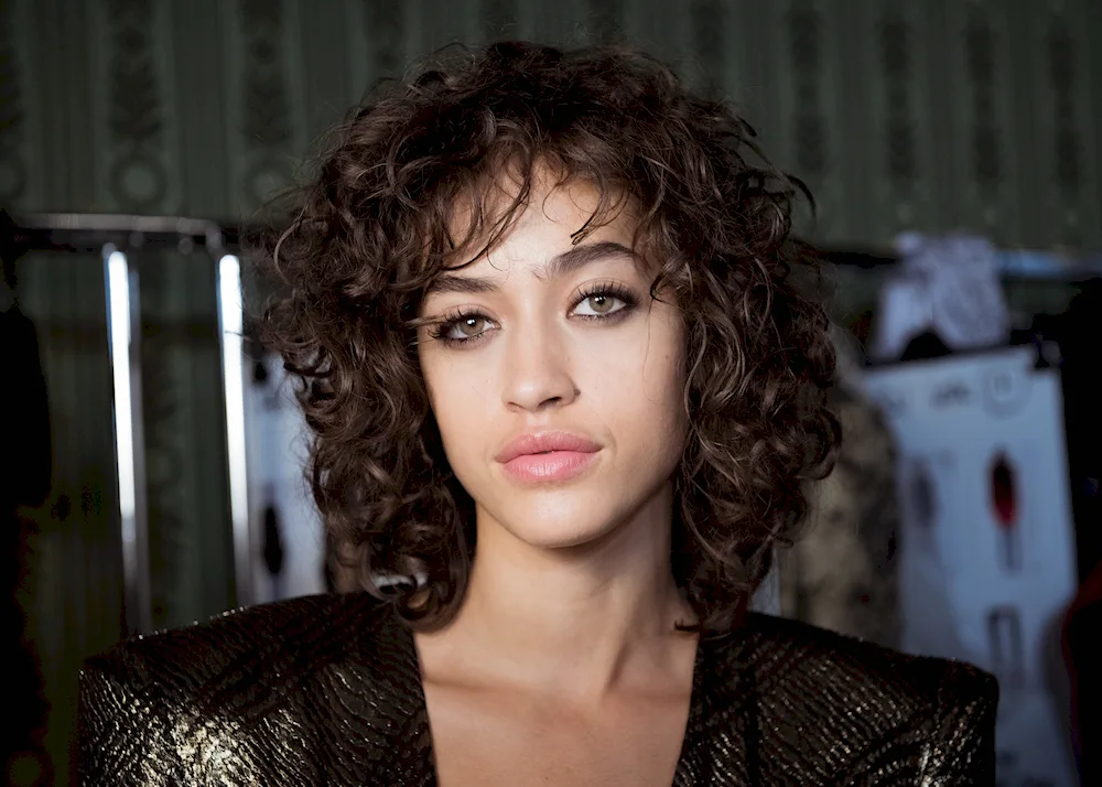 Eda Yildiz with curly bangs