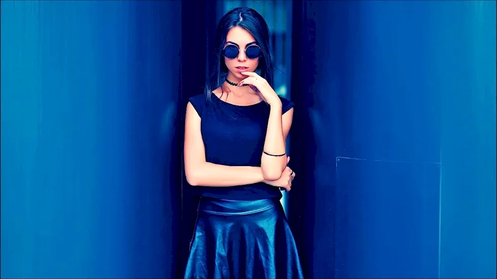 Eda Yildiz in a blue dress