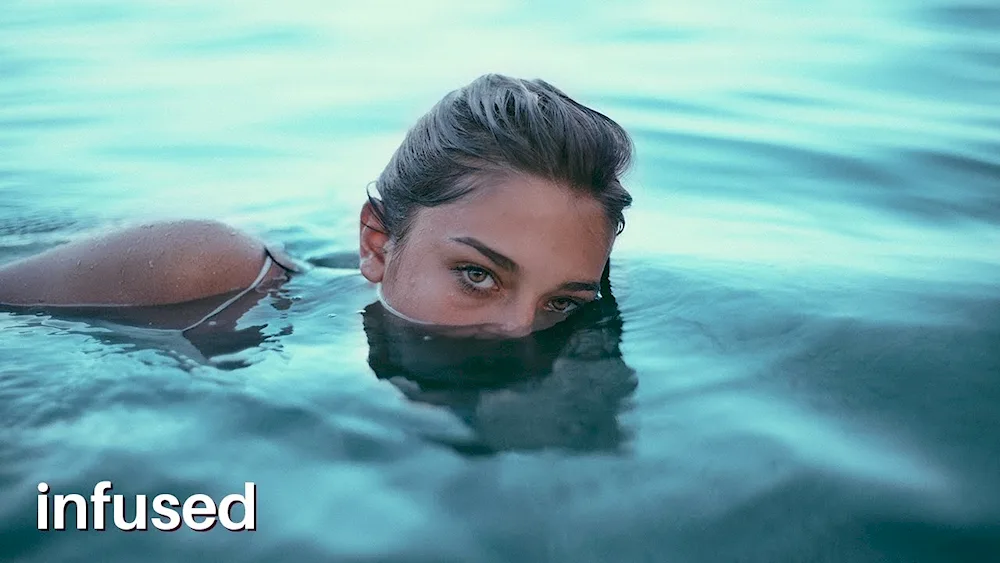 Emily Didonato swims in the pool